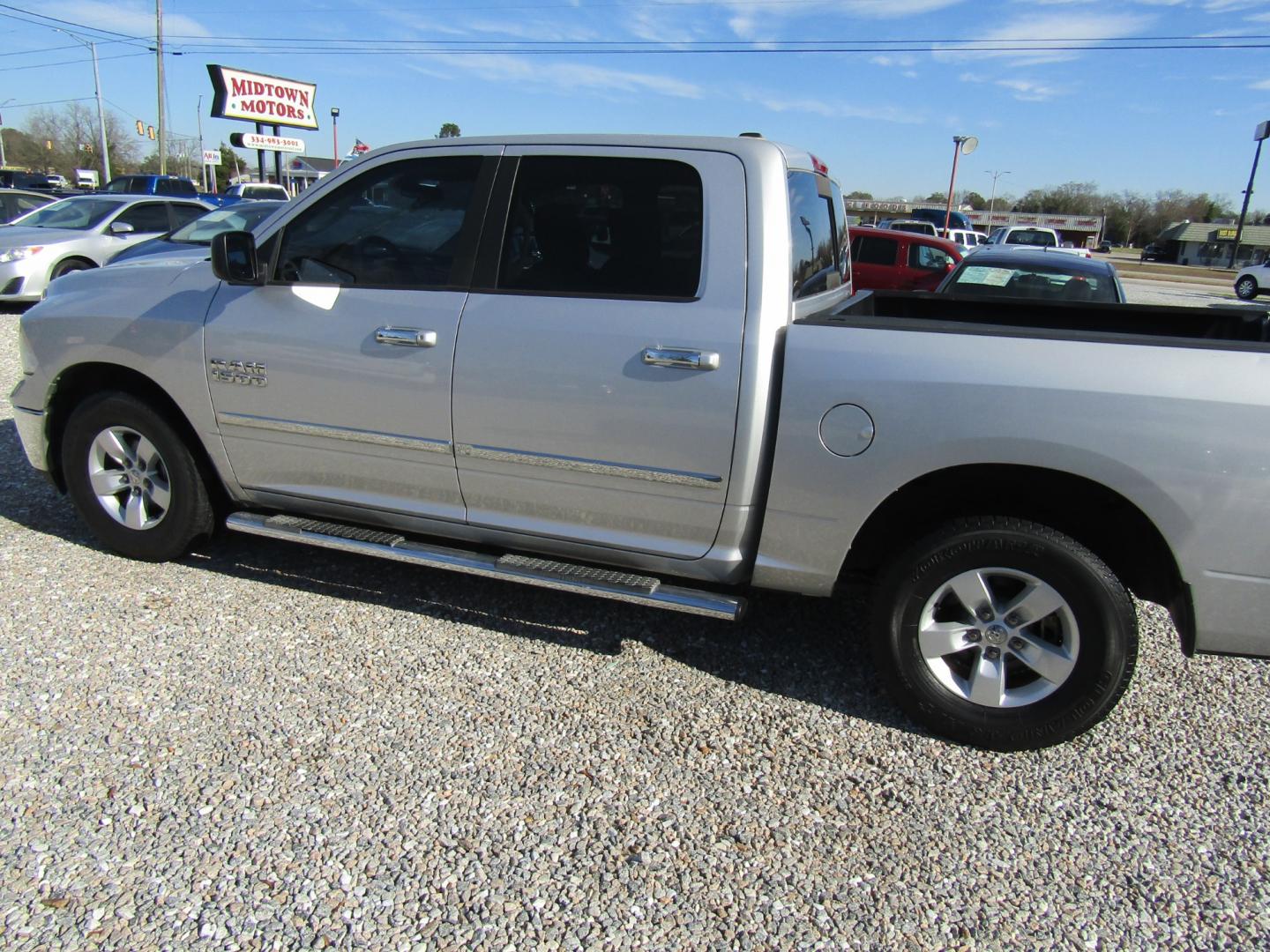 2013 Silver RAM 1500 SLT Crew Cab 2WD (1C6RR6LG9DS) with an 3.6L V6 engine, Automatic transmission, located at 15016 S Hwy 231, Midland City, AL, 36350, (334) 983-3001, 31.306210, -85.495277 - Photo#5